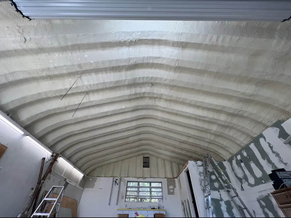 Spray polyurethane foam applied to the underside of a metal roof deck in Bangor